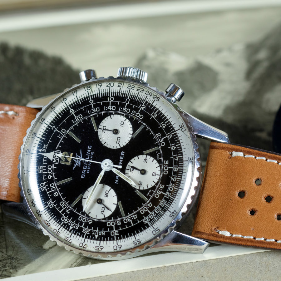 Vintage Breitling Navitimer on a leather racing tan watch straps from LUGS.shop