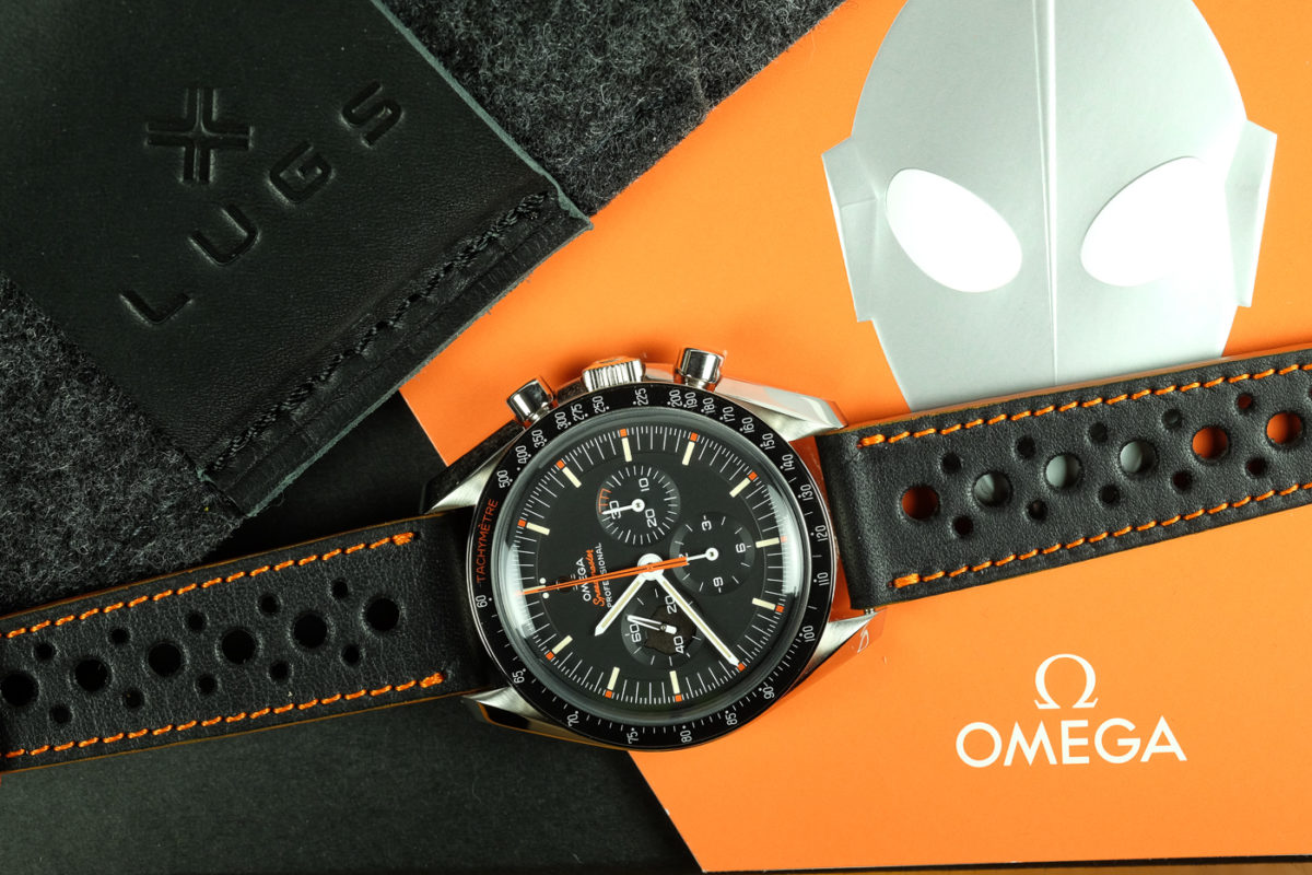 Speedmaster Ultraman on a smooth Rally Barenia deep black leather watch strap with orange stitching - LUGS brand